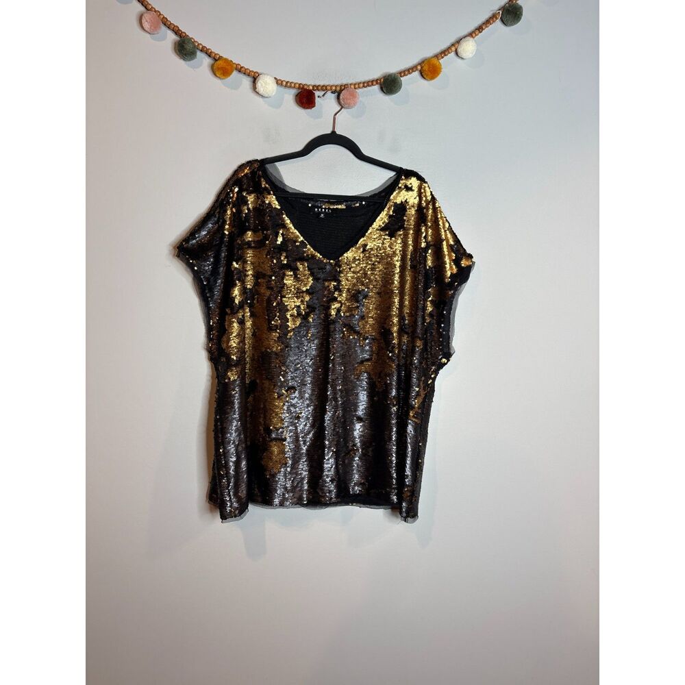 Rebel Wilson reversible sequin blouse